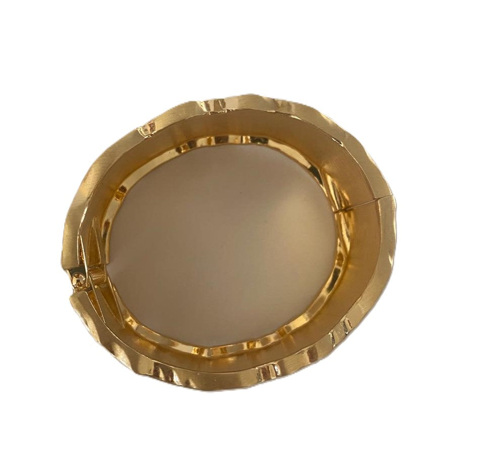 Pulsera ondulada dorada