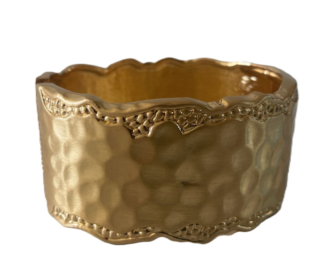 Pulsera ondulada dorada