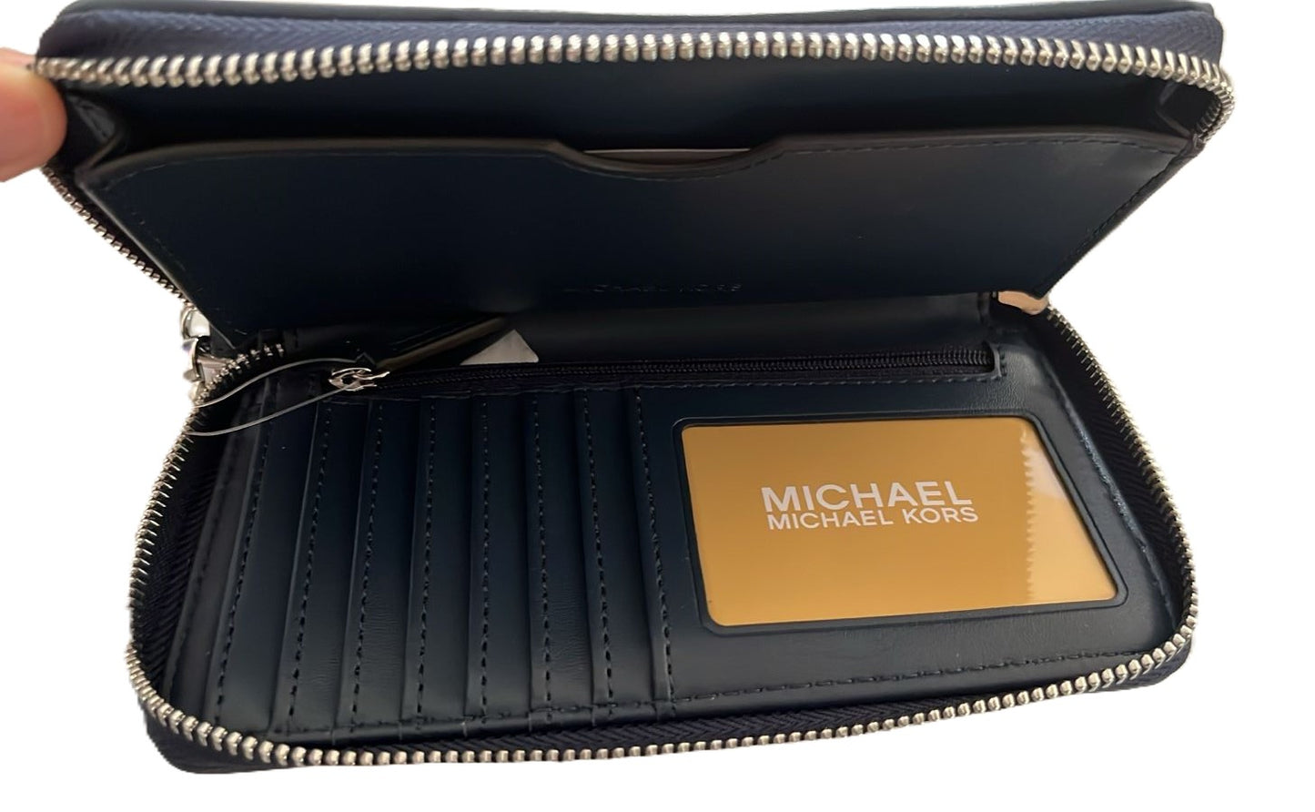 Muñequera Michael Kors.