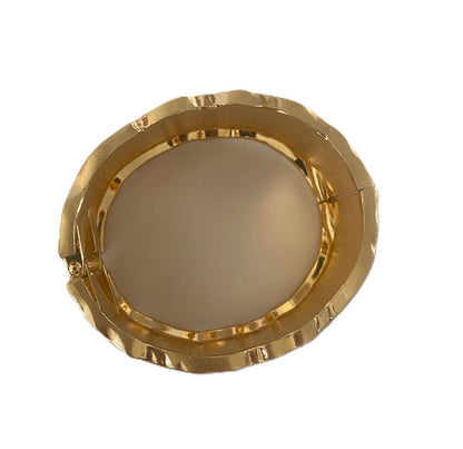 Pulsera ondulada dorada